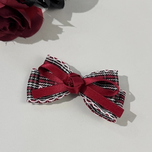 Elegant red plaid bow hair clip featuring a satin rose and ribbon for women's styling