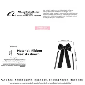 Detail of elegant black ribbon bow hair clip with white scalloped edges and dimensions