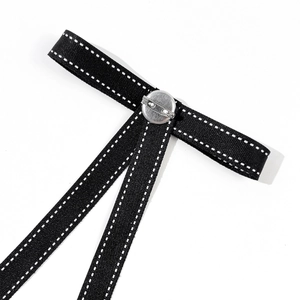 Black pre-tied bow tie with white stitching and silver metal brooch pin back
