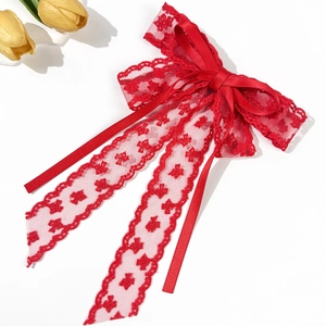 Elegant red lace bow hair clip with satin ribbons and floral embroidery for women