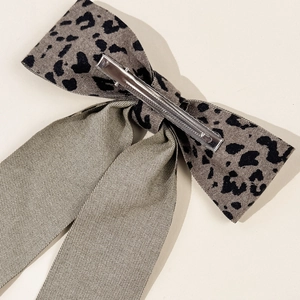 Vintage leopard print and green fabric bow hair clip with metal alligator grip