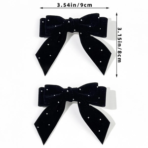 Pair of black velvet bow hair clips with rhinestones and metal spring clips