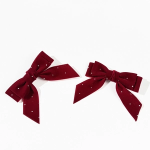 Elegant wine red velvet bow hair clips with pearls for a sweet aesthetic look
