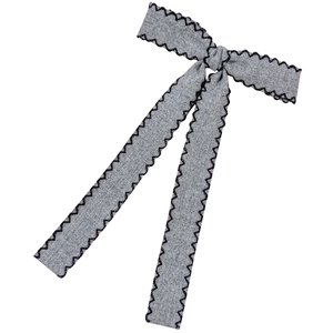 Elegant grey knit bow hair clip with black stitching and long flowing ribbons