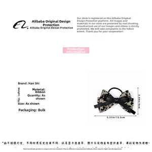 Detailed view of leopard print bow hair tie with dimensions and weight measurements