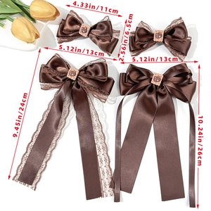 Brown lace bow hair clips set with cute bear biscuit resin charms on white background