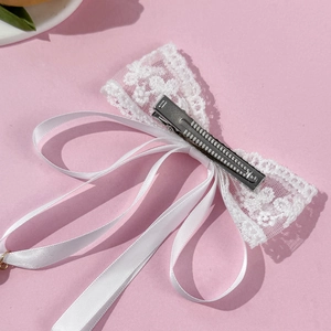 Elegant white lace bow hair clip with long satin ribbons for fairy style hairstyle