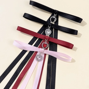 Elegant bow ribbon chokers with heart crystal pendants in various vibrant colors