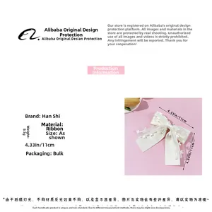 Détails de la barrette à nœud blanc crème avec dimensions 11cm et poids de 8,1g affichés