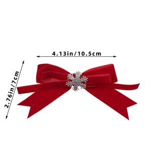 Detail showing dimensions of the red velvet Christmas bow clip with snowflake ornament