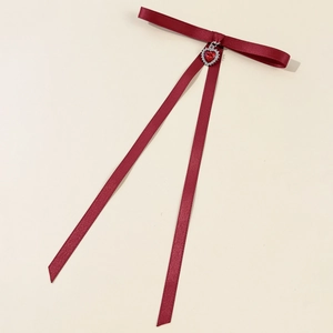 Elegant burgundy ribbon bow tie with red heart crystal pendant and long silk tassels