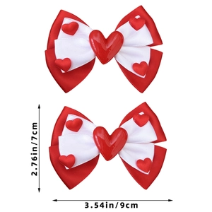 Detail view showing red and white bow hair clips with size dimensions 9cm by 7cm