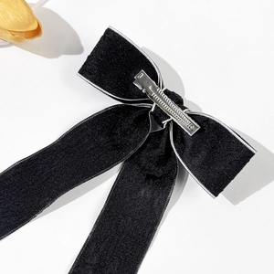 Barrette à cheveux nœud en velours noir avec bordure blanche et clip en métal robuste