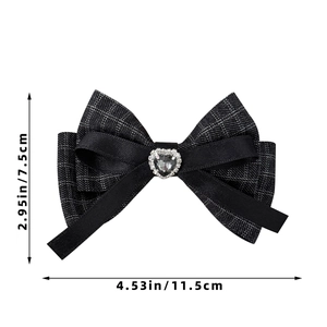 Detailed view of houndcheck bow hair clip with rhinestone heart gem and dimensions