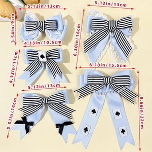 Blue Lolita style striped bow hair clips set with lace and poker card charms