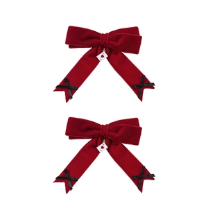 Pair of red velvet bow hair clips with heart Ace poker pendants and black ribbon details