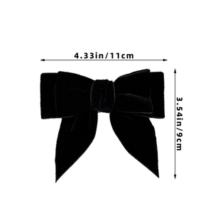 Detailed product dimensions of a black velvet bow hair clip with measurements in cm and in