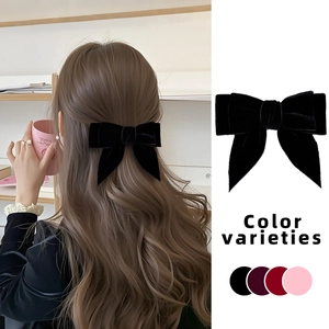 Vintage velvet bow hair clip for women available in black, burgundy, red and pink