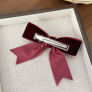 Elegant wine red velvet bow hair clip with vintage pearl design and metal duckbill clip