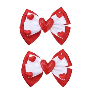 Sweet red and white bow hair clips with heart accents for girls and toddlers