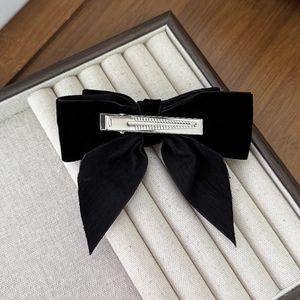 Elegant black velvet bow hair clip with silver metal alligator clip for women