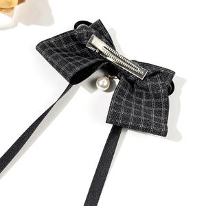 Elegant black plaid bow hair clip with white pearl pendant and long ribbons for women