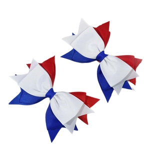 Set of two tricolor bow hair clips in red, white and blue ribbon with ribbed texture