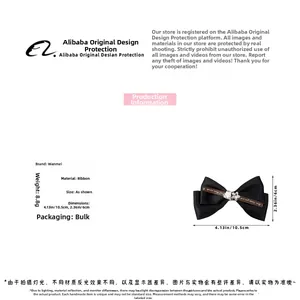 Detail view showing black ribbon bow hair clip with heart rhinestone and size 10.5cm x 6cm