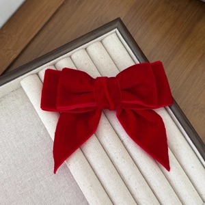 Elegant large red velvet bow hair clip for women with a vintage layered silk texture finish