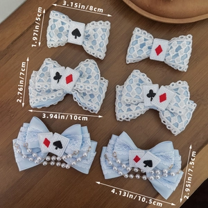 Blue Lolita lace hair clips with playing cards and pearls in various sizes and designs