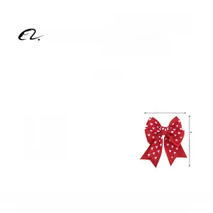 Detail showing red heart-print bow hair clip measurements 9cm width and 11cm length