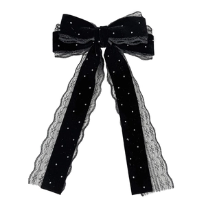 Pince à cheveux élégante en velours noir et dentelle avec strass et rubans flottants