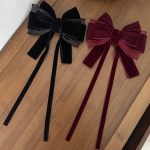 Elegant velvet mesh bow hair clips in black and wine red with long flowing ribbons