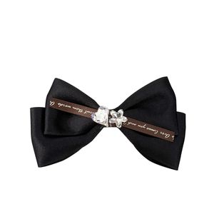 Elegant black satin bow hair clip with heart rhinestone and embroidered ribbon detail