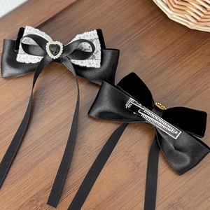 Lolita style black velvet bow hair clips with white lace and heart gem decoration
