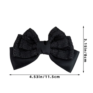 Détails du nœud en tweed et satin noir mesurant 11,5 cm par 8 cm pour cheveux