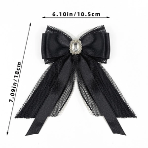 Detailed dimensions of black lace bow brooch with rhinestones measuring 18cm by 10.5cm