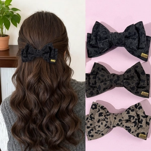 Vintage leopard print bow hair clip in three colors for a retro aesthetic style