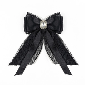 Elegant black lace ribbon bow brooch with center crystal gemstone and pearls