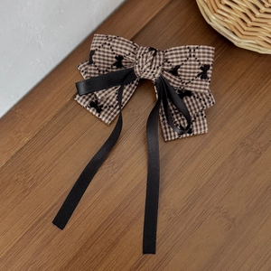 British style plaid bow hair clip with black long silk ribbons in a vintage aesthetic