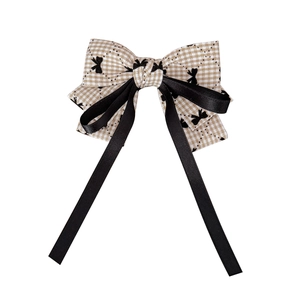 British plaid bow hair clip with long black ribbons and butterfly print accents