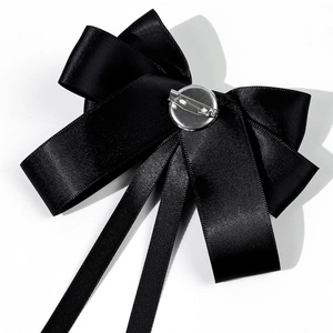 Elegant black satin multi-layer bow tie brooch with long ribbons and metal safety pin