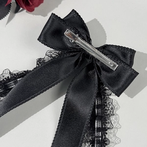 Barrette à cheveux Lolita en dentelle noire avec nœud et pince crocodile argentée