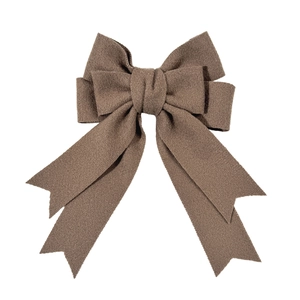 Maillard style brown velvet oversized bow hair clip with long ribbons on white background