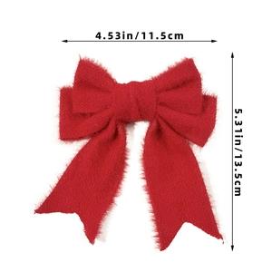 Detail view of a red velvet bow hair clip showing dimensions of 11.5cm by 13.5cm