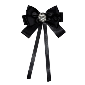 Elegant black satin bow tie with sparkling crystal center and long graceful ribbons