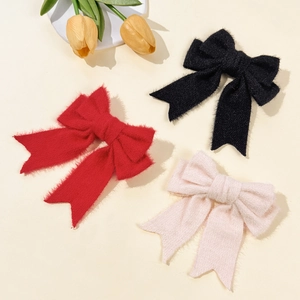 Elegant solid color wool bow hair clip with long ribbons in red black and pink