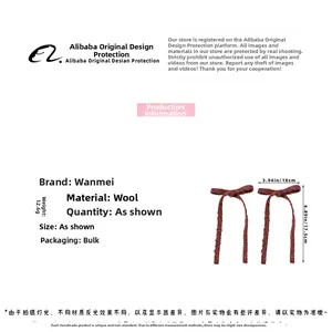 Detailed size parameters of the burgundy knitted bow hair clip with measurements