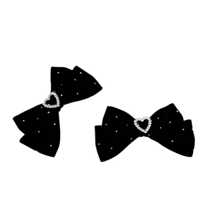 Pair of black velvet bow hair clips with heart rhinestones and sparkling crystal accents