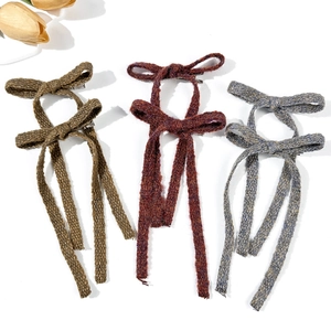 Three-piece set of knitted ribbon bow hair clips in vintage green, red, and grey colors